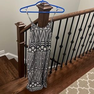 Calf length asymmetrical design spaghetti strap summer dress. slits on each side